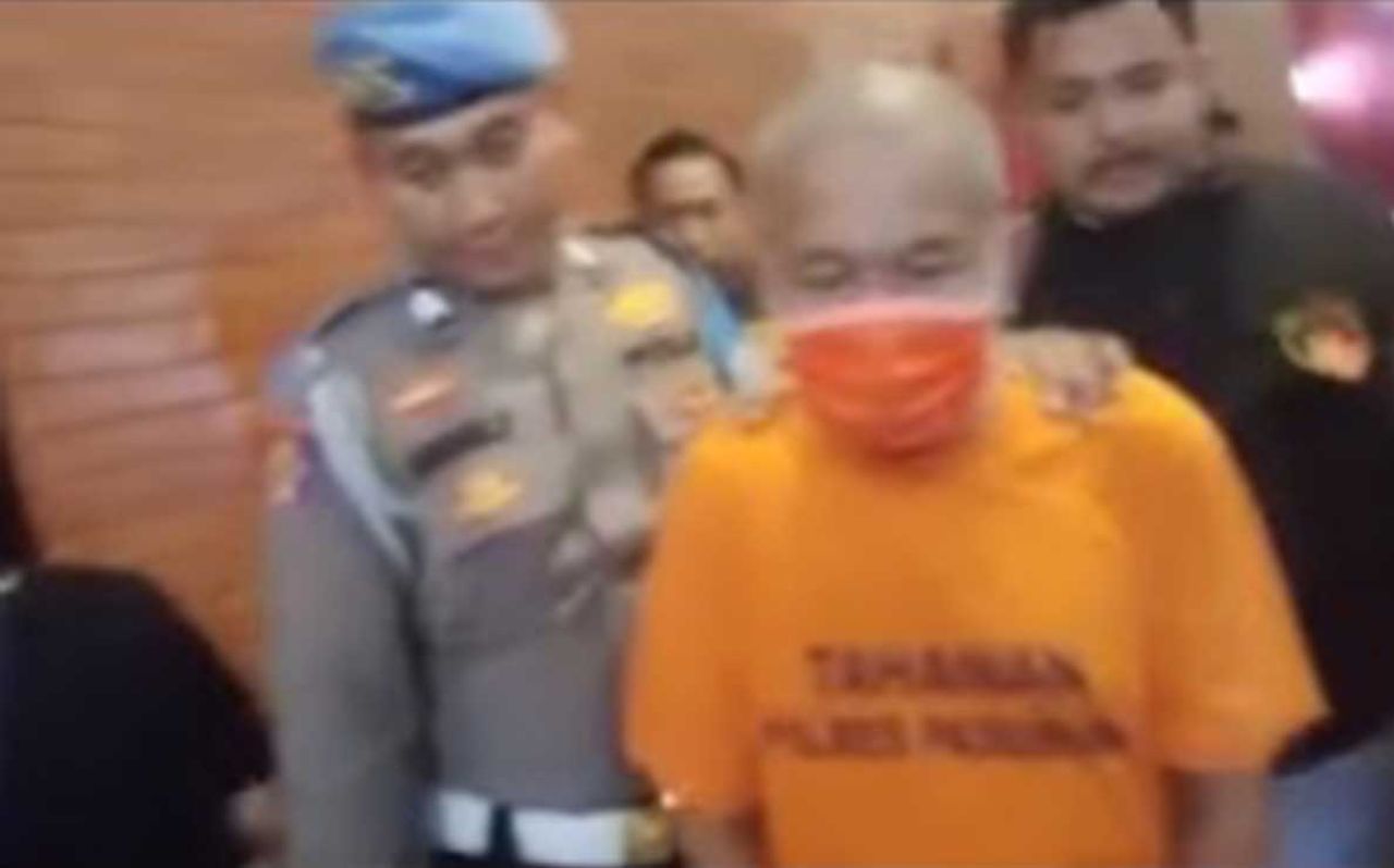 Saiful Anwar (pakai kaos tahanan)