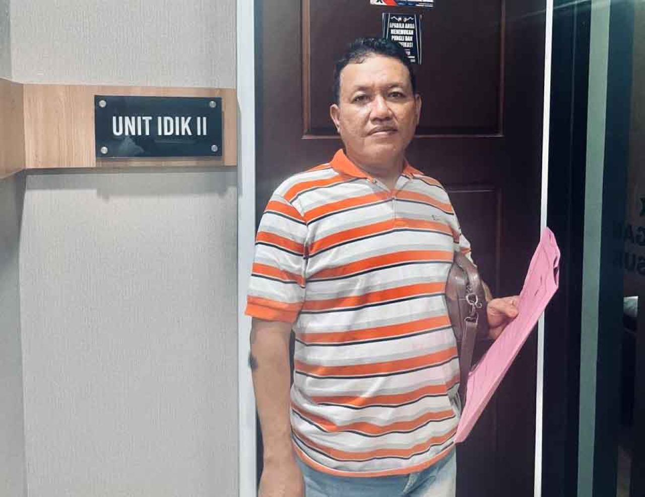 Qosim saat masuk ke ruangan untuk dimintai keterangan