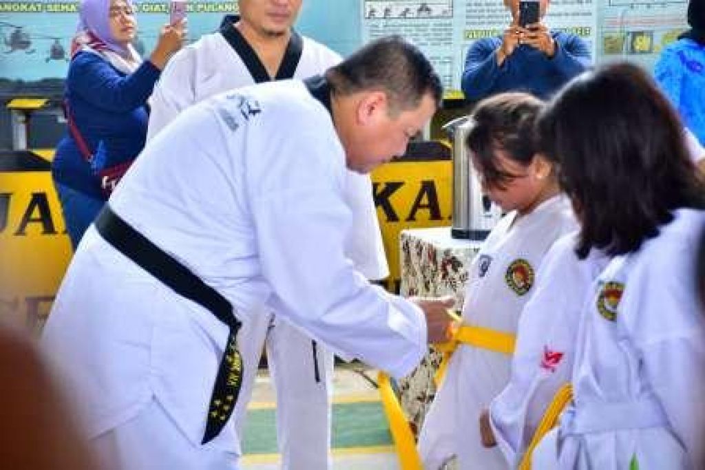 Penyematan sabuk kehormatan DAN V dari Kukkiwon Pusat Taekwondo Dunia Korea Selatan
